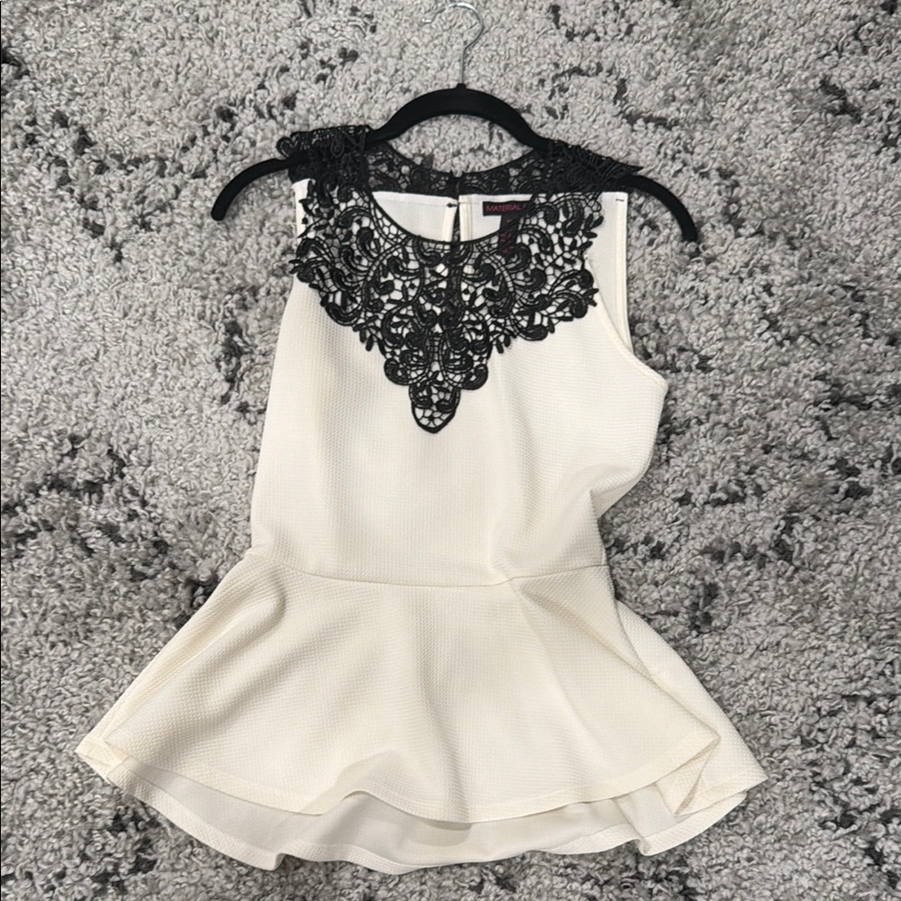 Elegant Cream Peplum Top with Black Lace Detail